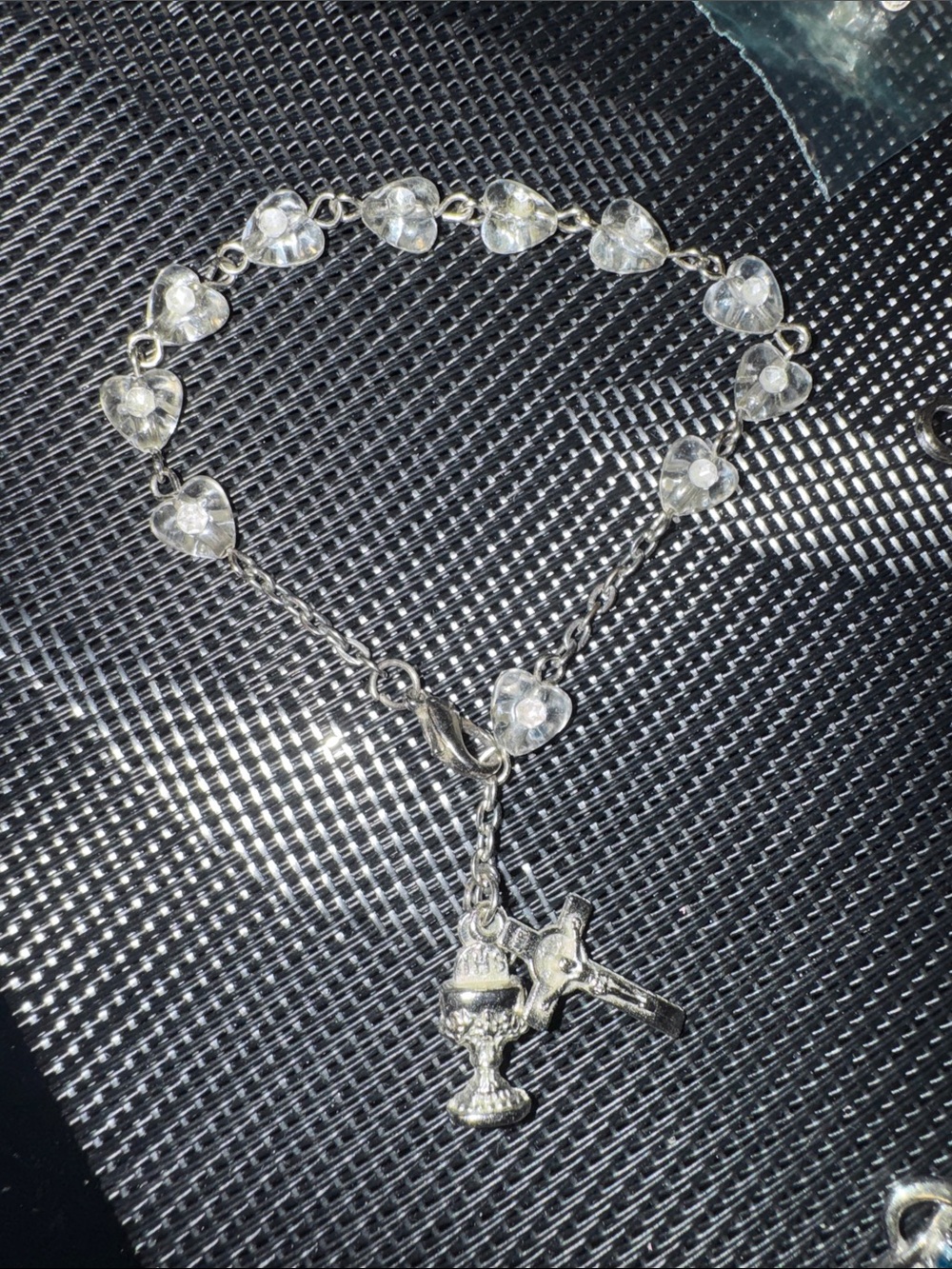 Silver Heart Bead Charm Bracelet with Cross and Chalice Pendants.  7.75”.